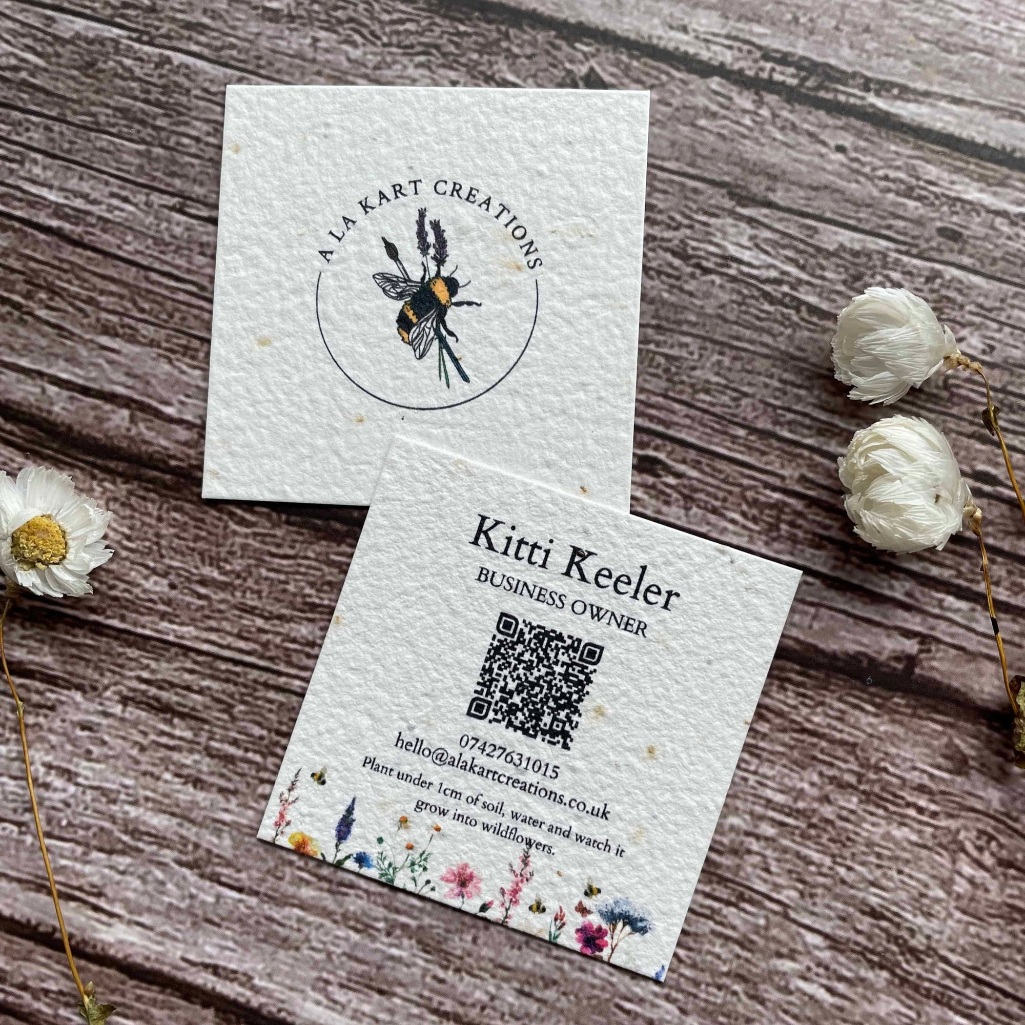 square plantable seed paper business cards with qr code, angled right, alakartcreations