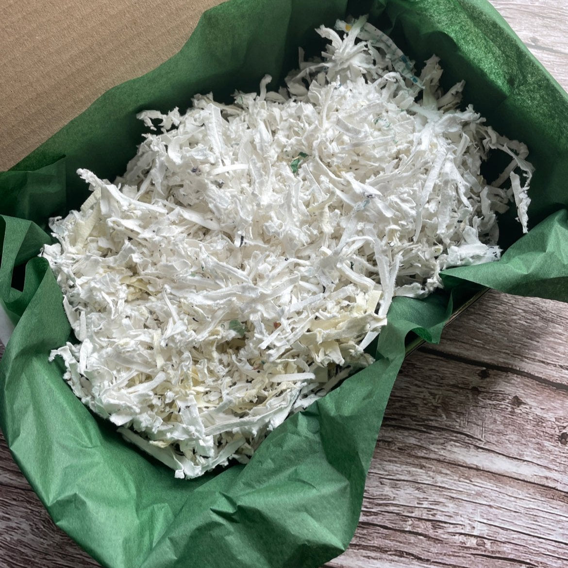 Front view of 1kg Plantable Shredded Box Filler showing eco-friendly packaging material.