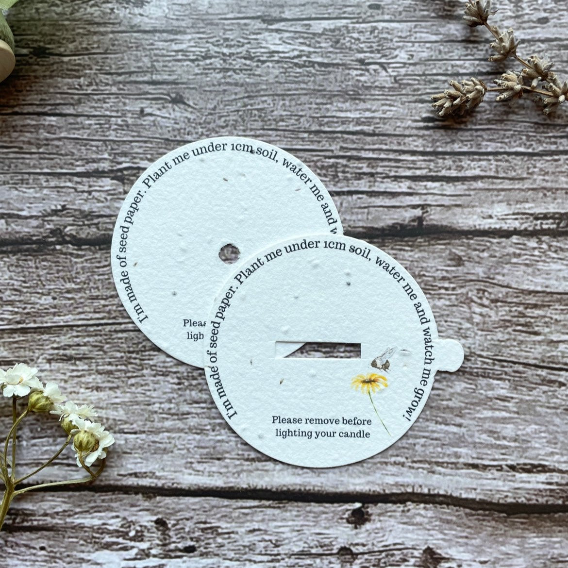 close-up front view of custom and pre-designed uk wildflower seed paper plantable candle dust covers by alakartcreations