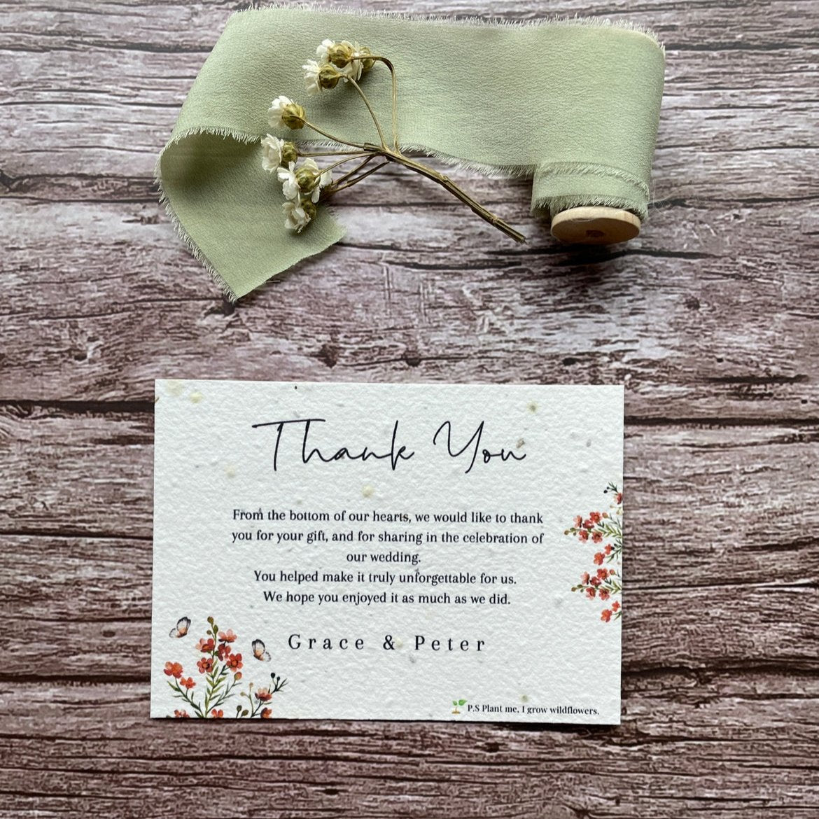 plantable seed paper wedding thank you cards in burnt orange theme, front view with floral design on wooden background, eco-friendly, alakartcreations
