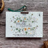 2026 seed paper calendar with floral design on a wooden surface