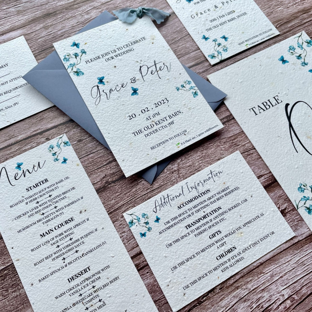 The Slate Blue themed Wedding Stationery range, featuring a Wedding invitation, table card, menu, information card, RSVP and thank you card.