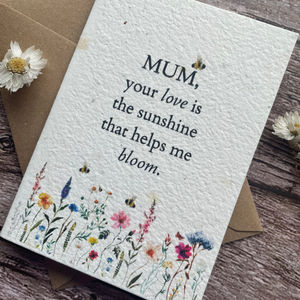 angled view of personalised plantable mother's day card with wildflowers and bees, message "mum your love is the sunshine that helps me bloom" - alakartcreations