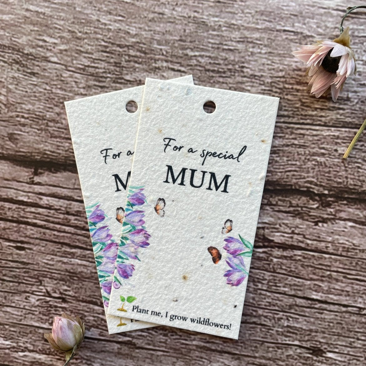close-up view of plantable mother's day gift tag with crocus design, 'for a special mum' and 'plant me' text alakartcreations