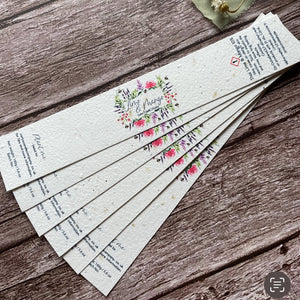 angled view of custom seed paper candle labels from alakartcreations