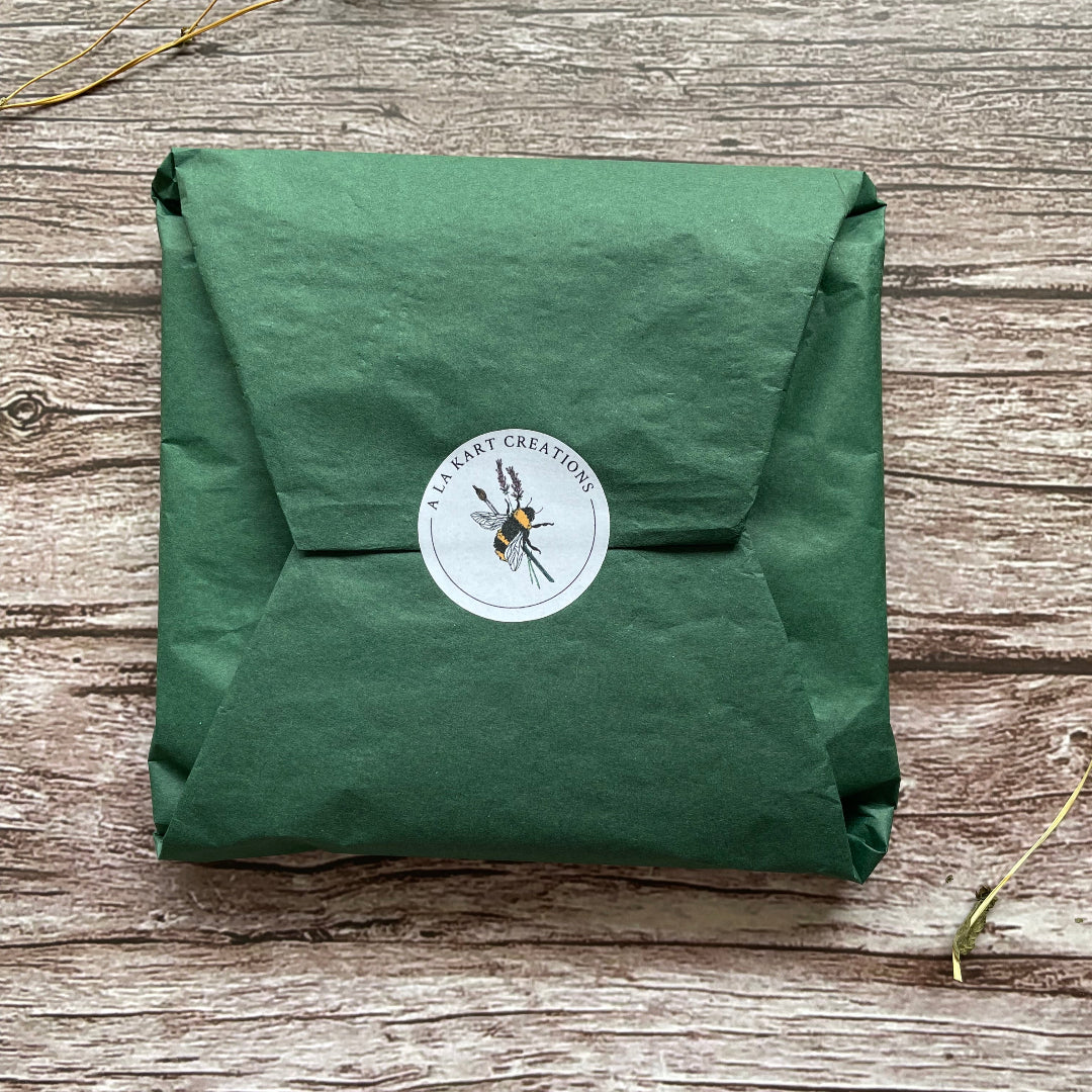 tissue paper gift packaging with round sticker for plantable calendar