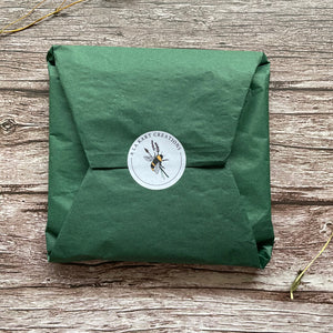 tissue paper gift packaging with round sticker for plantable calendar