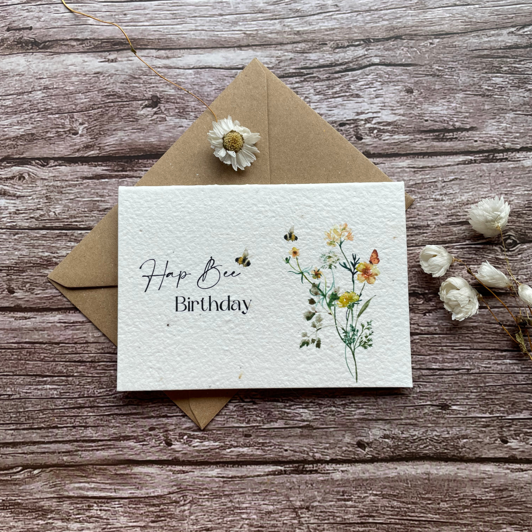 plantable birthday card featuring bees hovering over elegant wildflowers, handmade in the uk, eco-friendly with wildflower seeds inside, alakartcreations
