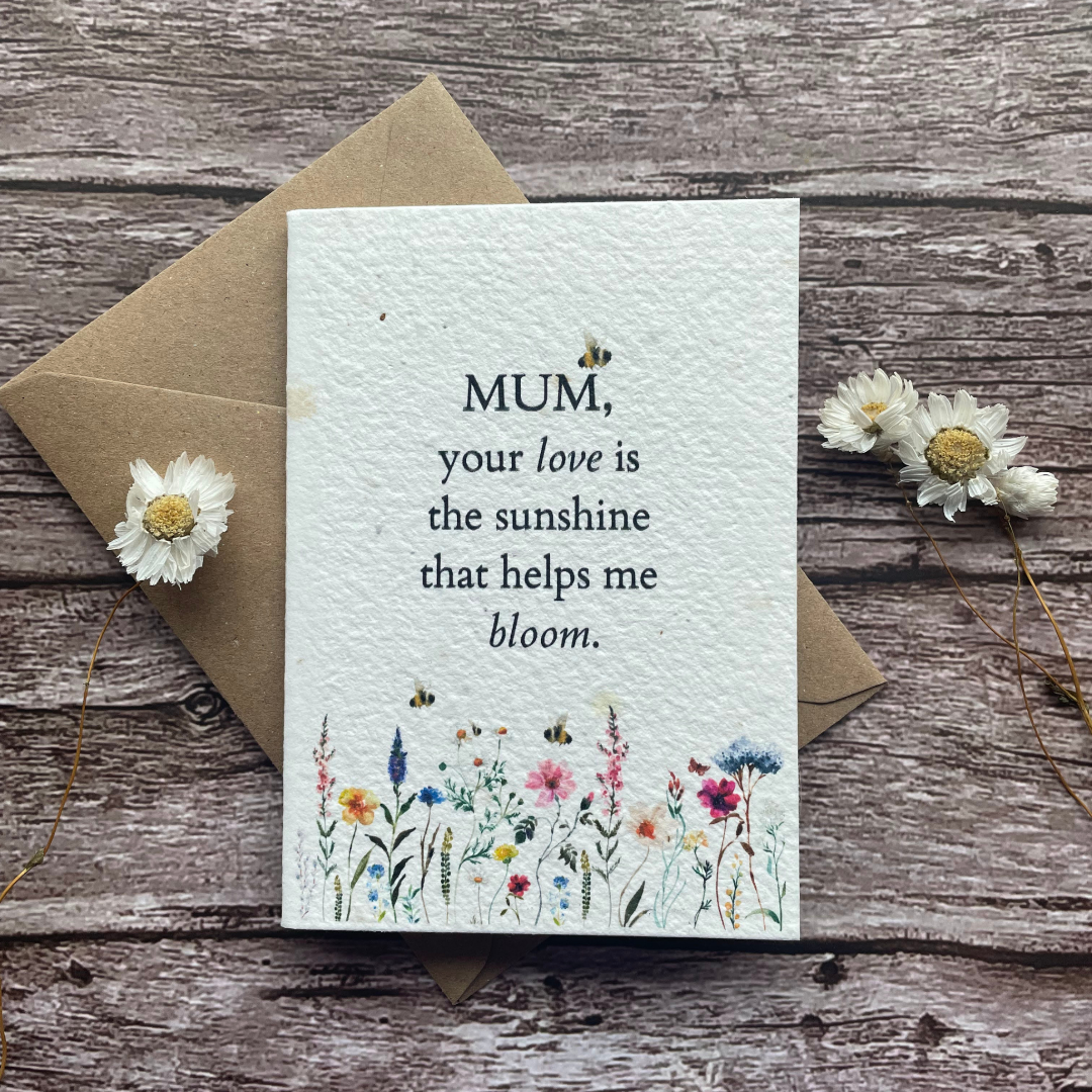 personalised plantable mother's day card with wildflowers and bees, message reads "mum your love is the sunshine that helps me bloom"