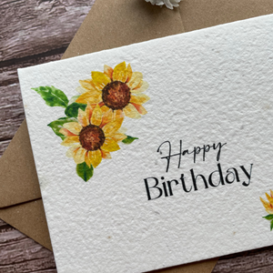 close-up view of personalised plantable birthday card with sunflower design, highlighting the uk wildflower seed paper texture, available at a la kart creations