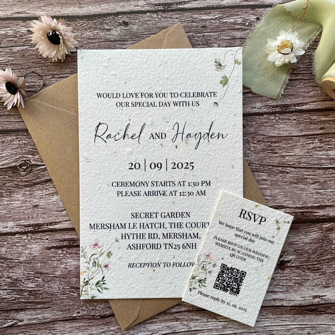 plantable wedding invitations spring green theme, front view with brown kraft envelope and qr code rsvp insert, floral design on wooden background