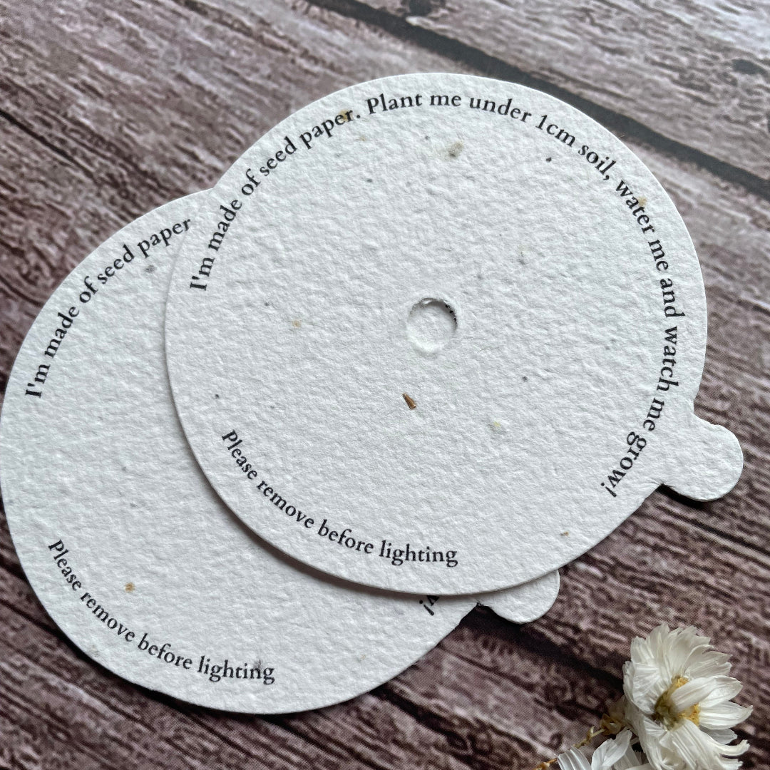 plantable candle dust covers on wooden surface