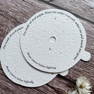 plantable candle dust covers on wooden surface