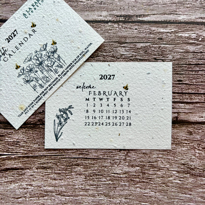 2027 February month plantable calendar on wooden background