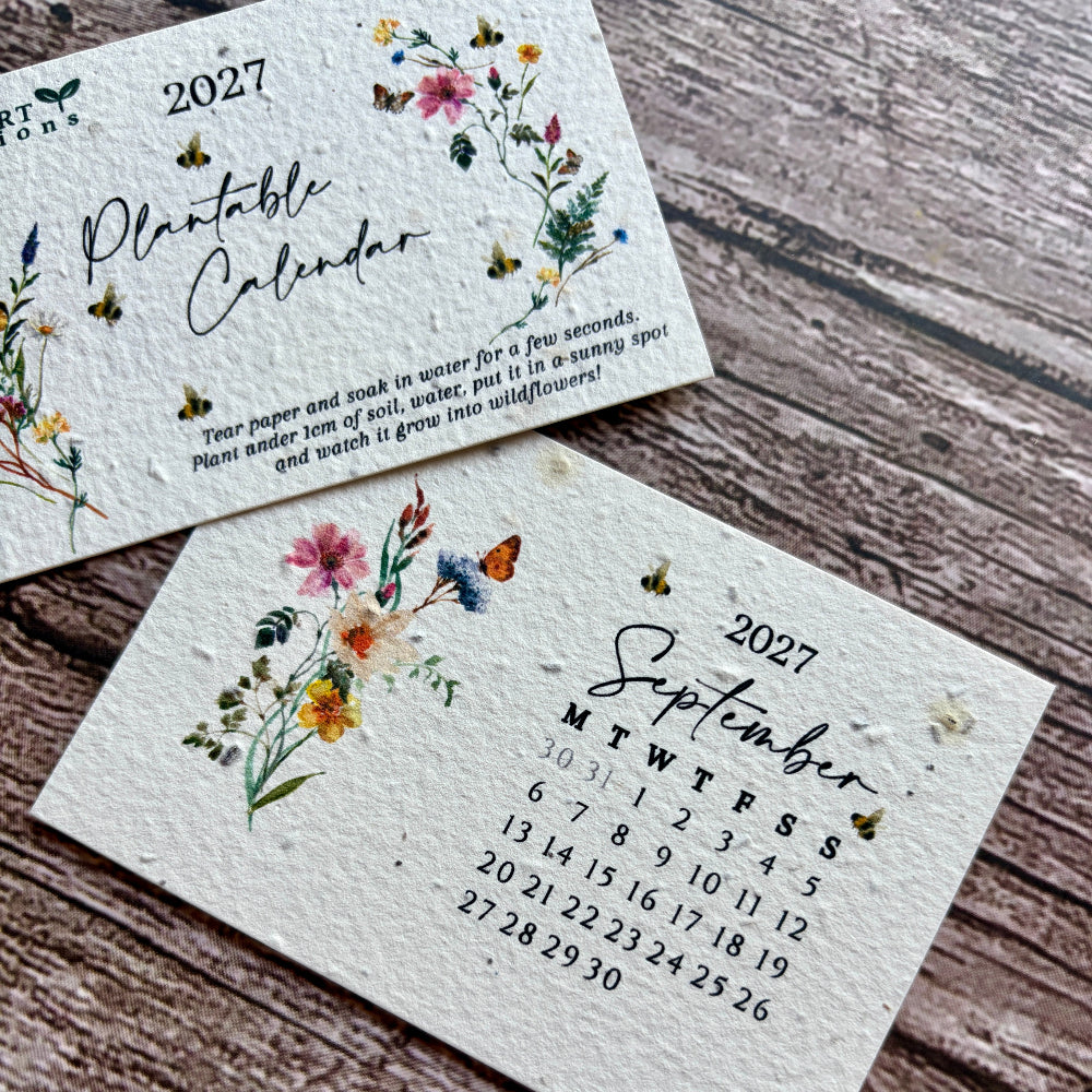 2027 plantable calendar showing Septmeber month on a wooden background