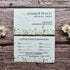 Plantable appointment reminder card from Summer Peach Bridal Shop on a wooden surface with flowers.