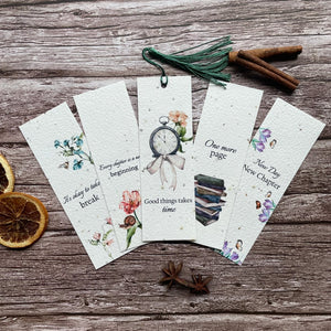 pack of 5 plantable bookmarks with designs of clocks, books, snail on a flower, flowers, and butterflies, made from wildflower seed paper