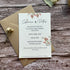 seed paper evening wedding reception invites on a wooden surface