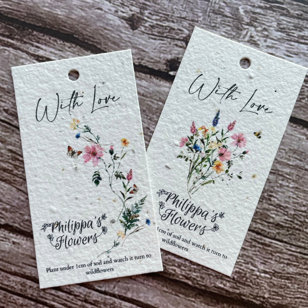 plantable florist gift tags on a wooden background