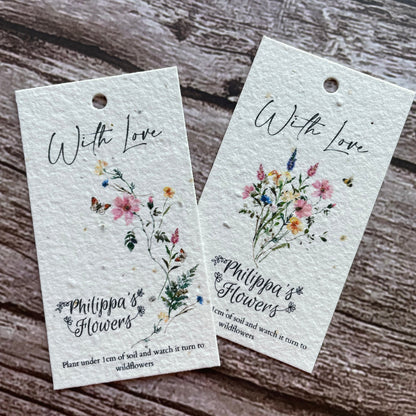 plantable florist gift tags on a wooden background