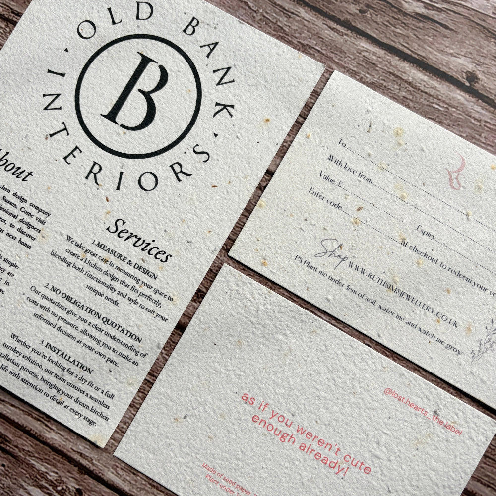 plantable flyers and postcards on a wooden surface