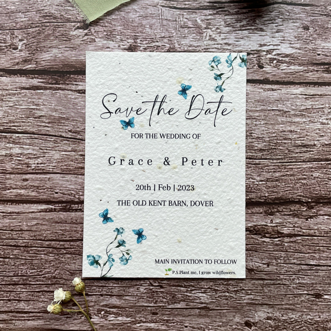 plantable seed paper save the dates on wooden surface