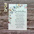 plantable seed paper seating plan for wedding with a butterfly garden on a wooden background
