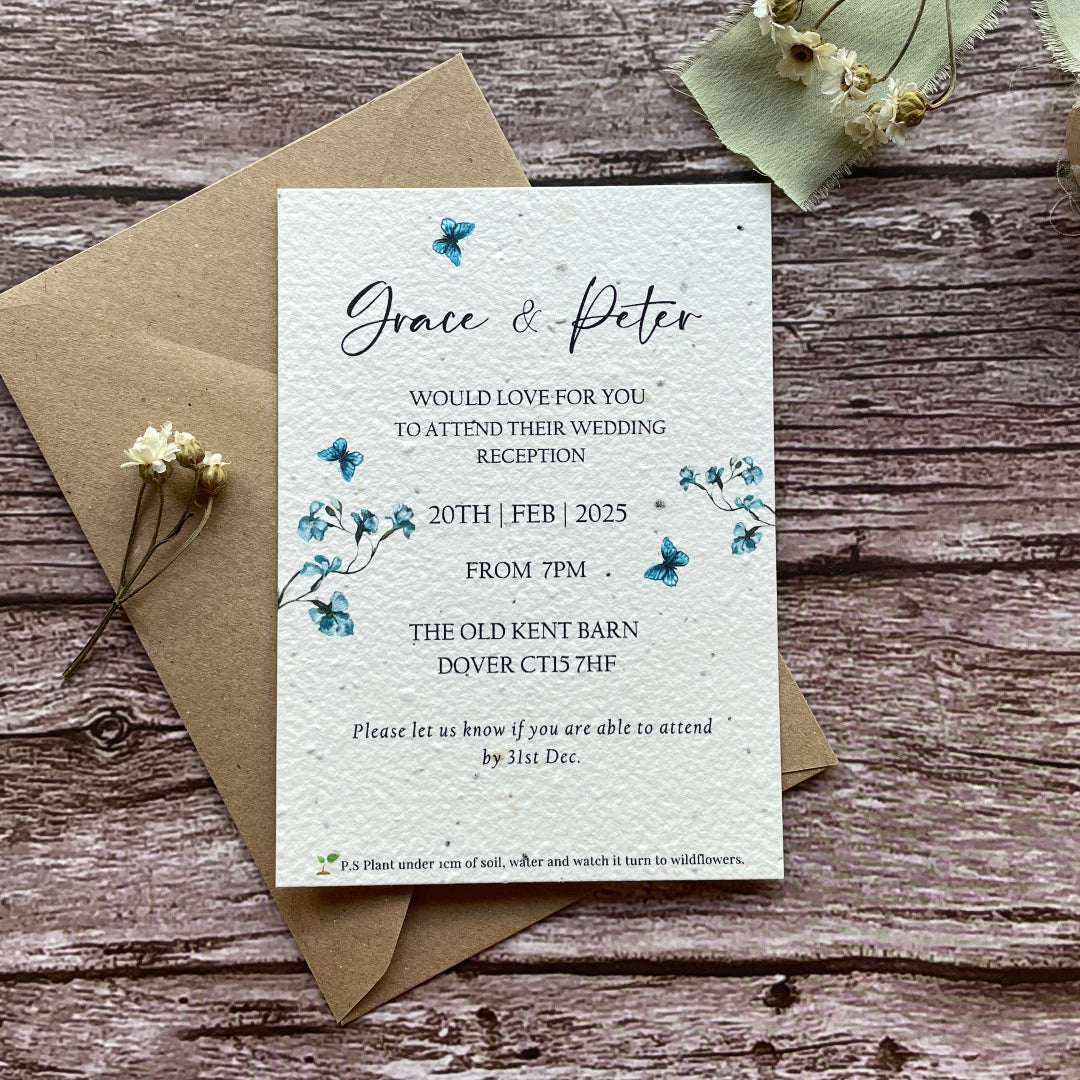plantable evening wedding invites on a wooden surface