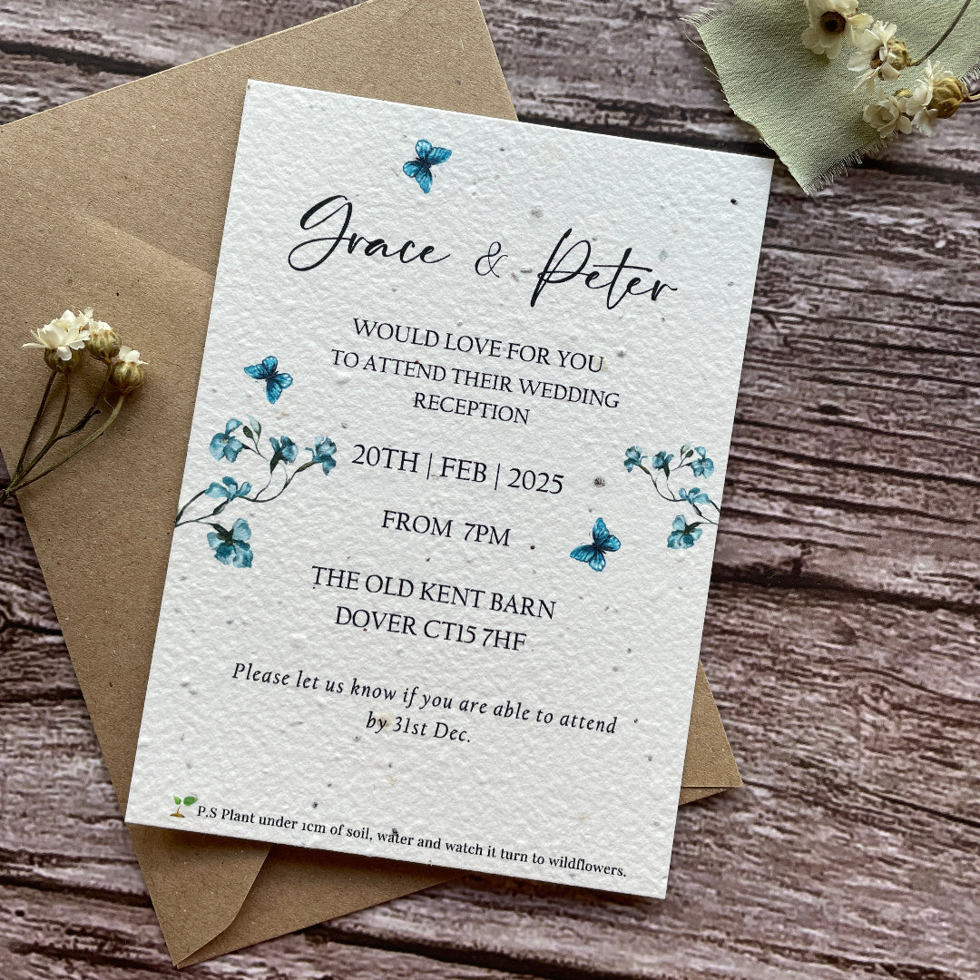 plantable evening wedding invites on a wooden surface