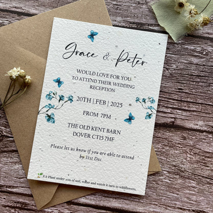plantable evening wedding invites on a wooden surface
