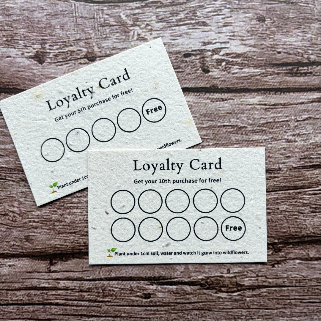 plantable seeded loyalty card on wooden surface