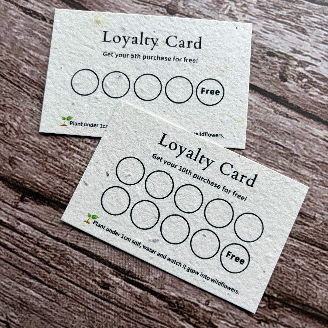 plantable seeded reward card on wooden surface