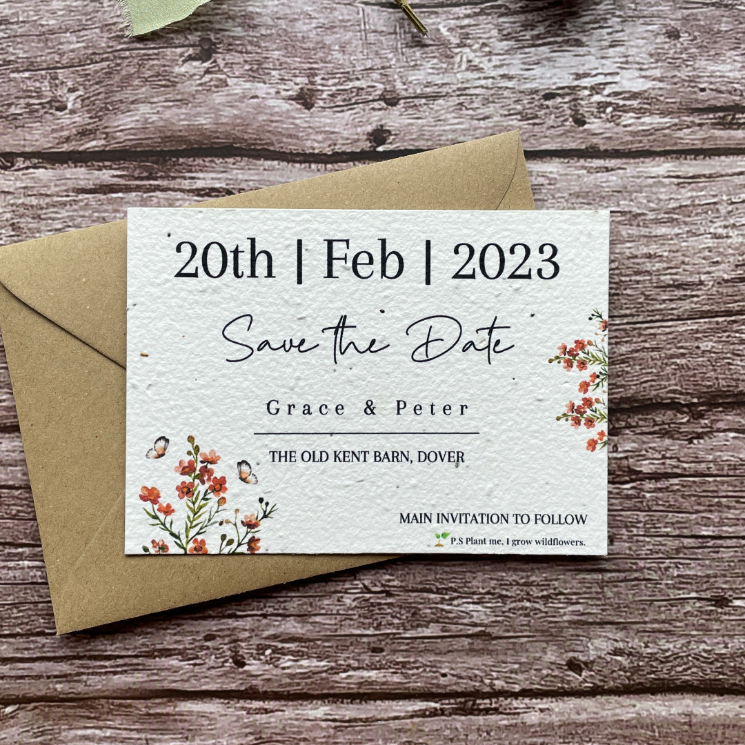 Wedding save the date invitation card with envelope on a wooden surface made of seed paper