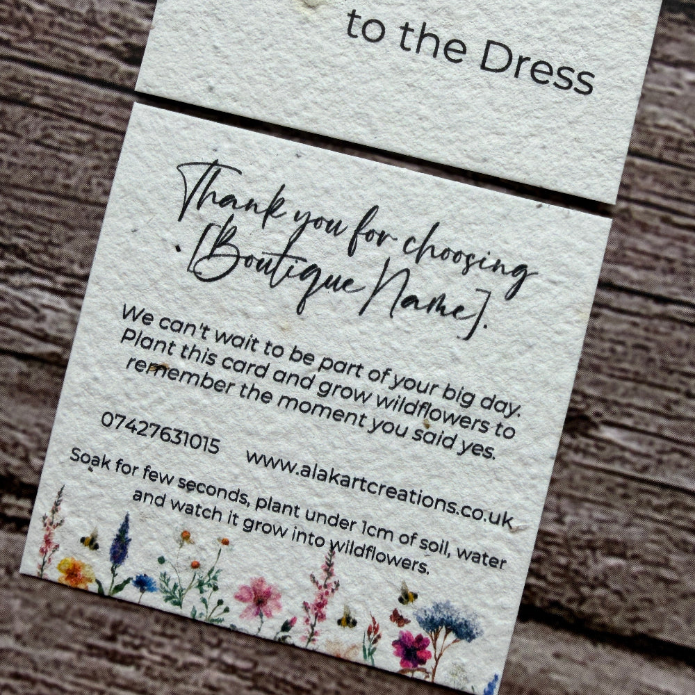 saying yes to dress plantable card on wooden background