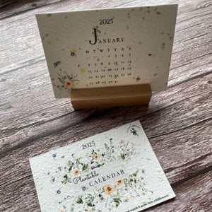 2025 seed paper calendar standing in a wooden block, showcasing the summer elegance design with vibrant floral illustrations, alakartcreations