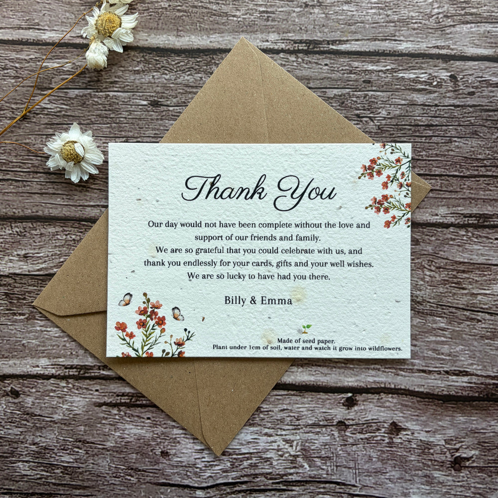 Wedding Plantable Thank you card with floral design on a wooden surface