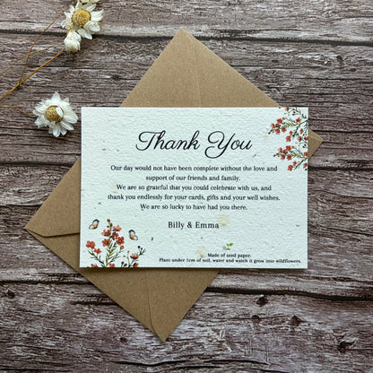 Wedding Plantable Thank you card with floral design on a wooden surface