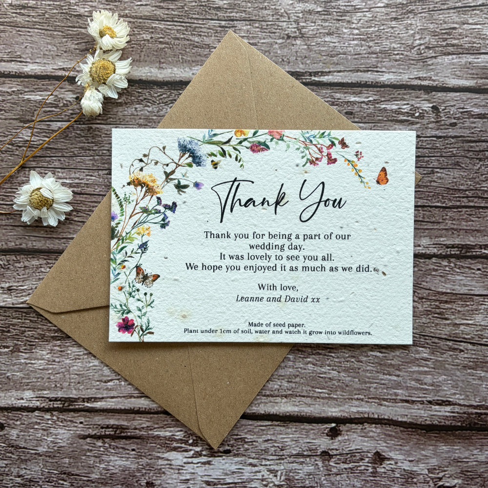 Plantable wedding Floral thank you card with envelope on a wooden surface