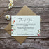 Plantable wedding thank you card with floral design and text on a wooden surface