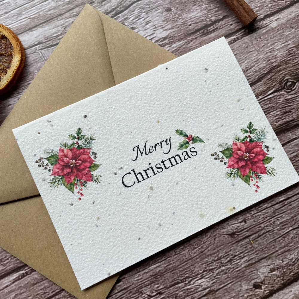 poinsettia plantable christmas card angled front, landscape design, eco-friendly card made from seed paper, alakartcreations