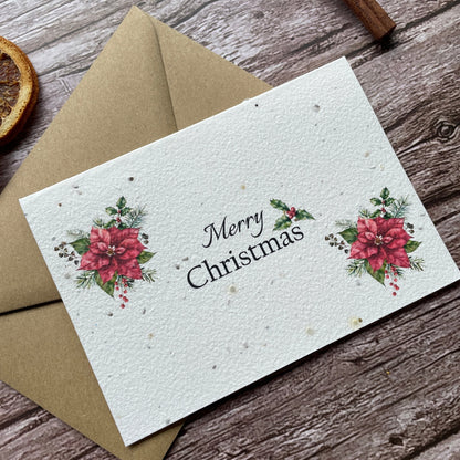 poinsettia plantable christmas card angled front, landscape design, eco-friendly card made from seed paper, alakartcreations