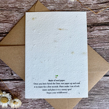 seed paper back side with planting instructions on a wooden surface