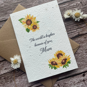 left angled view of personalised plantable sunflower mother's day card with message "the world is brighter because of you mum," handmade in the uk by a la kart creations