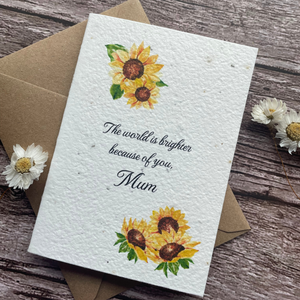 angled view of personalised plantable sunflower mother's day card with message "the world is brighter because of you mum," handmade in the uk by a la kart creations