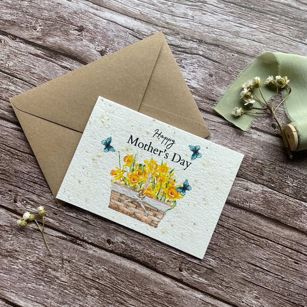 angled right view of personalised plantable mother's day card featuring daffodils and "Happy Mother’s Day" message alakartcreations