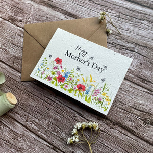 angled right view of personalised seed paper mother's day card featuring wildflower meadow illustration and "Happy Mother’s Day" message alakartcreations