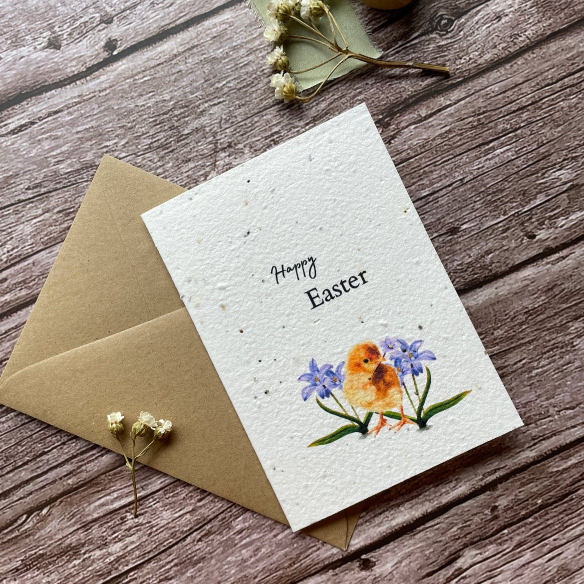 personalised plantable easter card with yellow baby chick surrounded by flowers, angled left view, alakartcreations