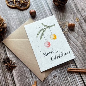 baubles plantable christmas card angled front, portrait design, eco-friendly card made from seed paper, alakartcreations