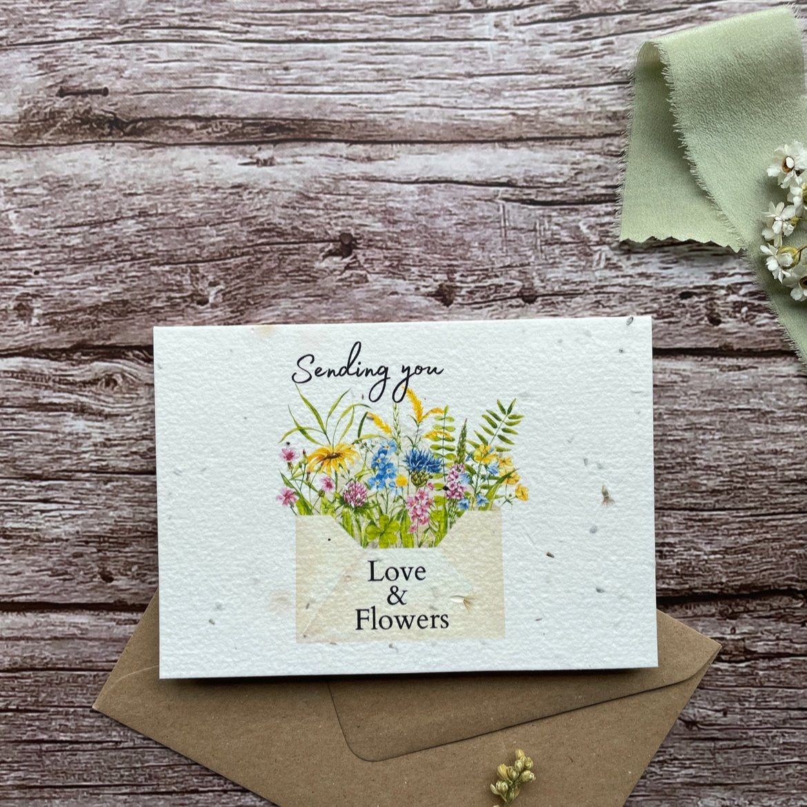 Front view of the Love and Flowers Letter Personalised Plantable Card featuring a beautiful flower design.