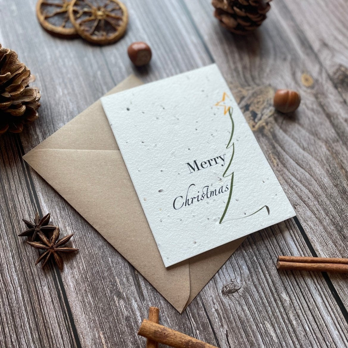 minimalistic christmas tree plantable christmas card angled front, portrait design, eco-friendly card made from seed paper, alakartcreations